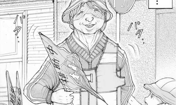 交差点に立つ人